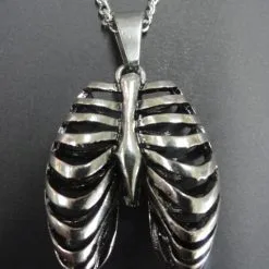 DISCOBOLE Pendentif En Forme De Cage Thoracique